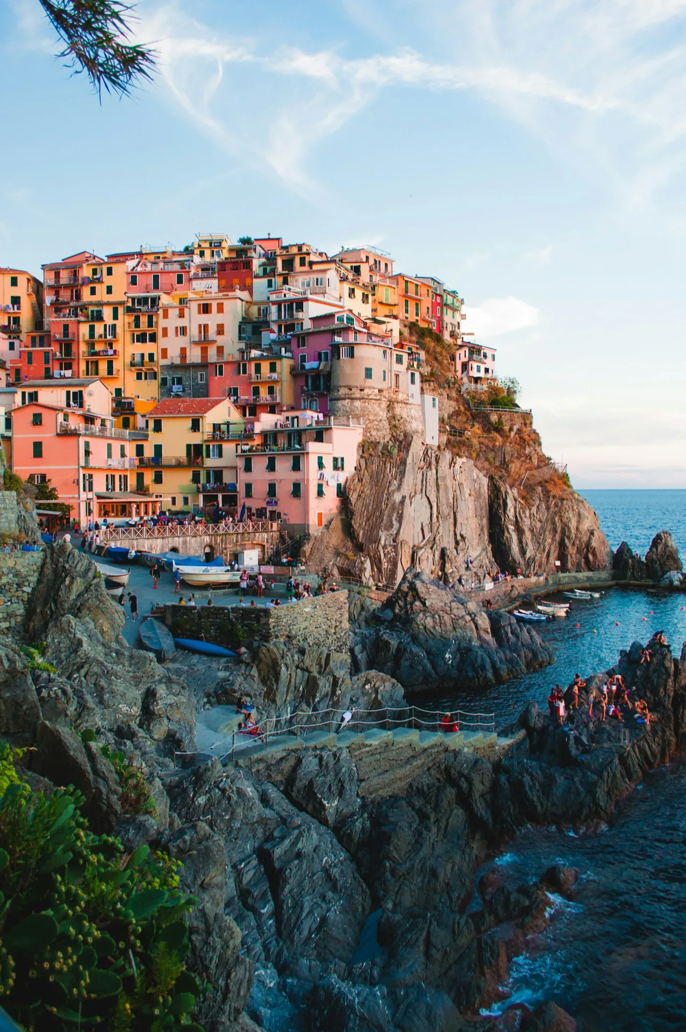 Historic colorful European coastal village with cliffside buildings